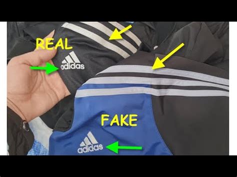 how to tell fake adidas tracksuit|how to spot a fake adidas.